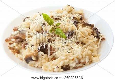 Tasty Appetizing Risotto On A White Plate On A White Background
