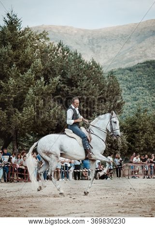 Rider Riding On His Horse Performing Exhibition..