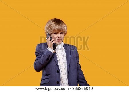 Not A Joyful Boy In A Business Suit Talking On The Phone.