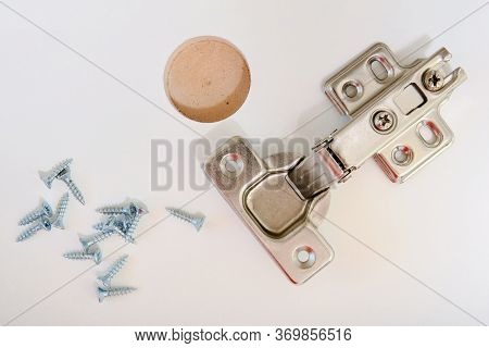 Furniture Hinge In The New Kitchen Cabinet Door Closeup, Flat Lay