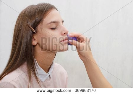 The Process Of Removing Excess Tone Cream.