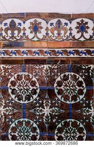 Wall Tiles With Traditional Geometrical Floral Motive, But More Modern Style Thanks To A High Glossy