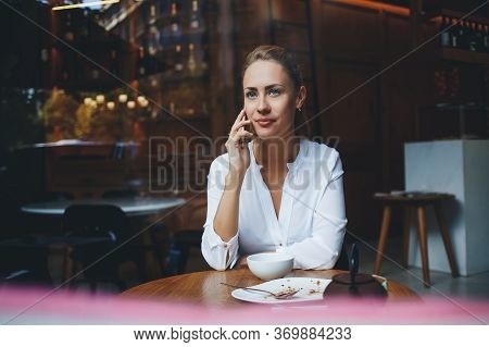 Smiling Female Lawyer Is Talking On Mobile Phone About Her Winning Trial