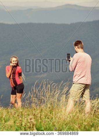 One More Shot. Travel Together With Darling. Couple Taking Photo. Couple In Love Hiking Mountains. L