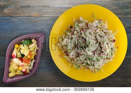Salad Daikon, Onions And Dill On Blue Grey Wooden Background. Salad On Yellow Plate With Vegetarian 