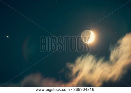 Night of a moon eclipse, dark nighttime sky background with an obscuration, horror holiday, Halloween night
