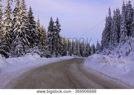 Road To Transalpina Ski Resort In Winter, Covered In Snow, Romania
