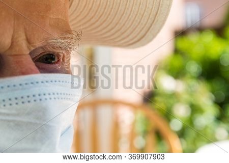 Elderly Man Wearing Face Mask As Coronavirus Protection,hampshire,united Kingdom.
