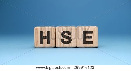 Hse Word Cube On A Blue Background. Business Concept.
