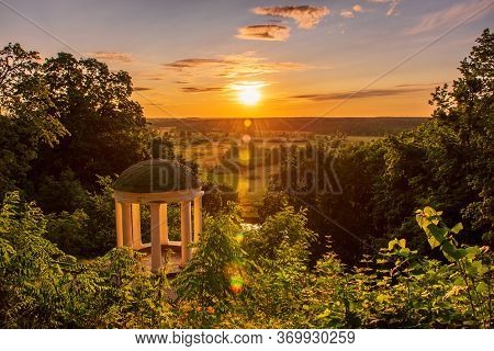 Old Pavilion In A Picturesque Location With Green Trees And Sun Shining. Sednev.ukraine