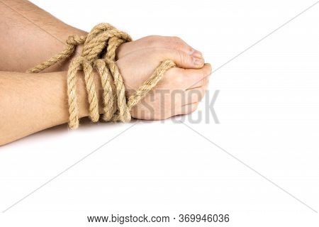 Mans Hands Are Tied With A Rope Isolated On A White Background. Bound Hands. Modern Slavery