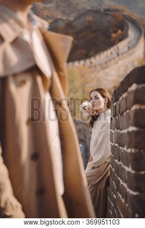 Beautiful Young Couple Posing At The Great Wall Of China