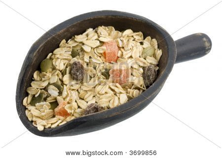 Kaşık müsli tahıl Papaya, Pepitas ve kuru üzüm