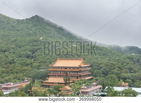 View Of Po Lin Monastery In The Mountains In Ngong Ping Village On Lantau Island, Hong Kong