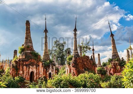 Ruins Of Ancient Stupas Of Shwe Indein Pagoda Over Blue Sky. Indein Village, Inle Lake, Shan State, 