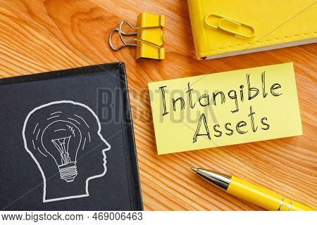 Intangible Assets Is Shown On A Business Photo Using The Text