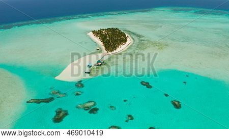Seascape With Beautiful Beach And Tropical Island Surrounded By A Coral Reef From Above. Onok Island
