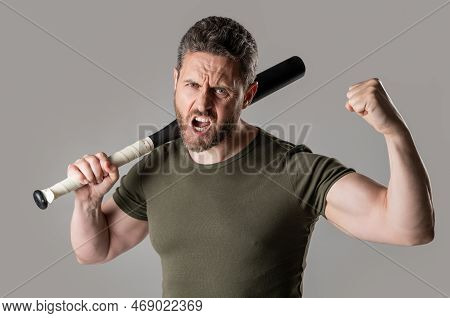 Shouting Aggression Of Angry Man With Bat In Studio. Photo Of Angry Man Hold Bat.