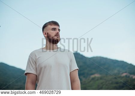 Happy Handsome Man Relax Nature, Young Calm Carefree Man Traveler With Open Raised Hands Enjoy Mount