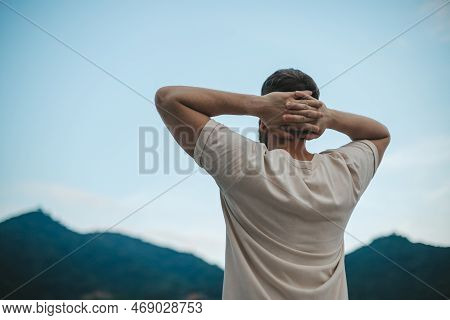 Happy Handsome Man Relax Nature, Young Calm Carefree Man Traveler With Open Raised Hands Enjoy Mount