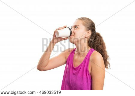 Adult Female Model Wearing Gym Attire Pink Tanktop Drinking Coffee From Paper Cup As Morning Gym Wor