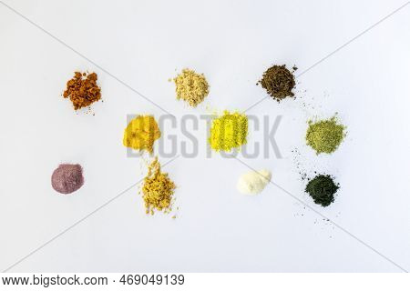 Sprinkled Powder Of Tablets, Vitamin And Nutritional Supplements. In Turn: Curcumin, Vitamin C, Ant 