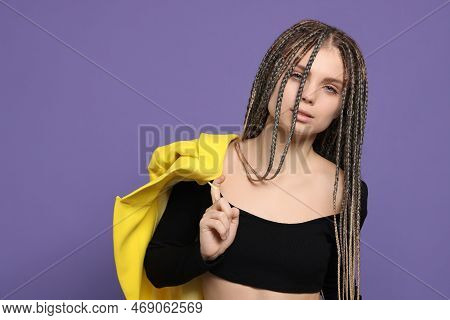 Beautiful Woman With Long African Braids On Purple Background, Space For Text
