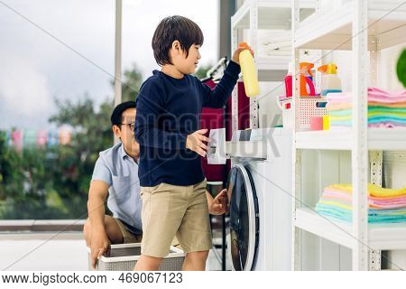 Family Asian Father And Kid Little Boy Son Having Fun Doing Household Chores Doing Laundry Dirty Clo