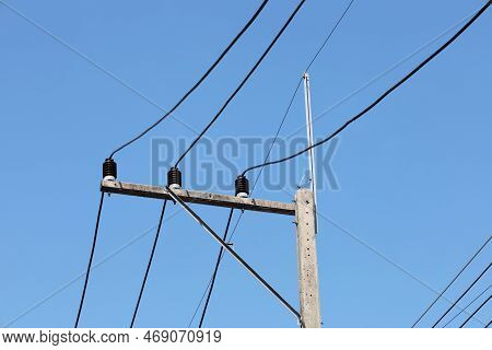 Unfinished Electric Wires On Poles. Closeup Of High Voltage Electric Wires On Unattached Support Arm