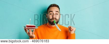 Close-up Of Funny Adult Man Celebrating His Birthday, Holding Bday Cake With Candle, Blowing Party W