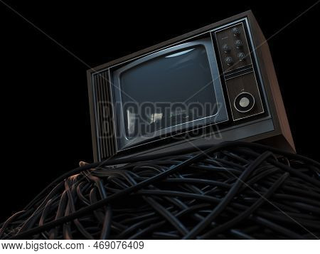 A Vintage 80's Television Perched On A Jumbled Pile Of Black Cables On A Dark Omnious Background - 3