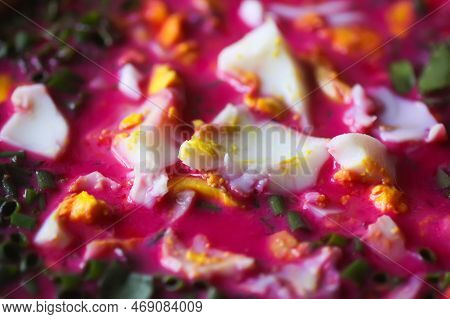 Cold Beetroot Soup With Boiled Eggs And Greenery. Traditional Summer Food.