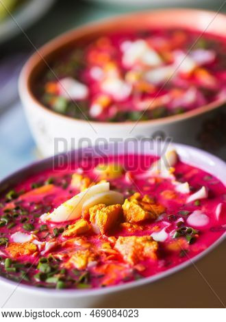 Cold Beetroot Soup With Boiled Eggs And Greenery. Traditional Summer Food.