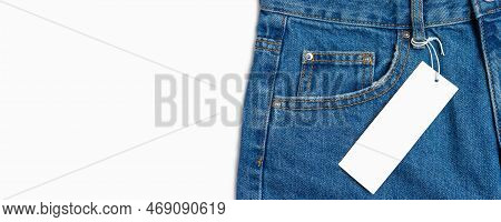Front Side Pocket And Price Tag Of Blue Jeans Pants Close-up Isolated On White Background, Mockup, B