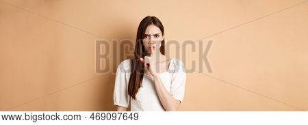 Angry Young Girl Scolding Bad Behavious, Shushing And Frowning Mad, Tell To Be Quiet, Looking Disple