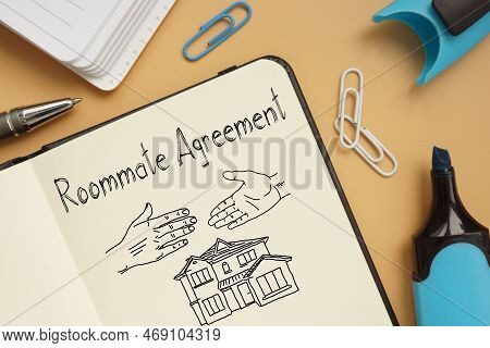 Roommate Agreement Is Shown On A Business Photo Using The Text