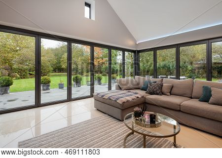 Willingham, Cambridgeshire - October 30 2018: Luxury Modern Open Living Room With Bifold Patio Doors