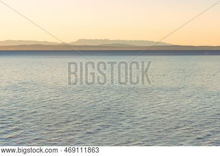 Adriatic Sea And Island Of Cres On Horizon Seen From The Town Of Lovran In Croatia