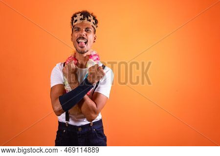 Carnival Outfit Party. Portrait Of Black Man With Carnival Props Having Fun