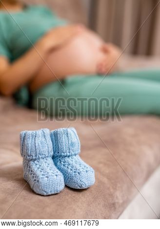 A Pregnant Woman Shows A Thumb Up. Baby Mother Healthcare.