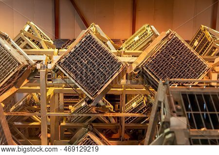 Production Of Cremant Sparkling Wine In Burgundy, France. Automatically Powered Riddling Remuage Box