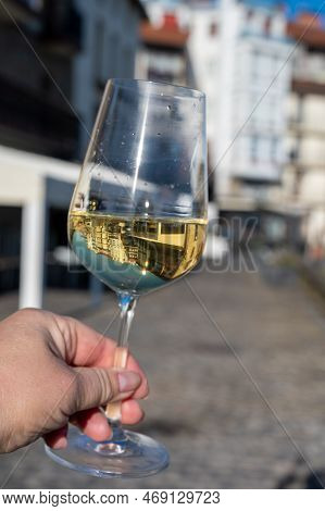 Tasting Of Txakoli Or Chacolí Slightly Sparkling Very Dry White Wine Produced In Spanish Basque Coun