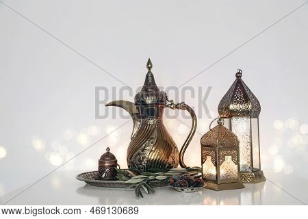 Festive Ramadan Kareem, Iftar Dinner Still Life. Glowing Moroccan Ornamental Lanterns, Arabic Dallah
