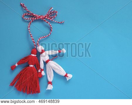 Martisor Red And White Dolls On A Blue Background. Greetings Or Invitation For Holiday Martisor And 