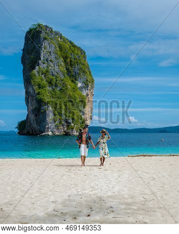 Koh Poda Krabi Thailand, Asian Woman And European Men On The Tropical Beach Of Koh Poda