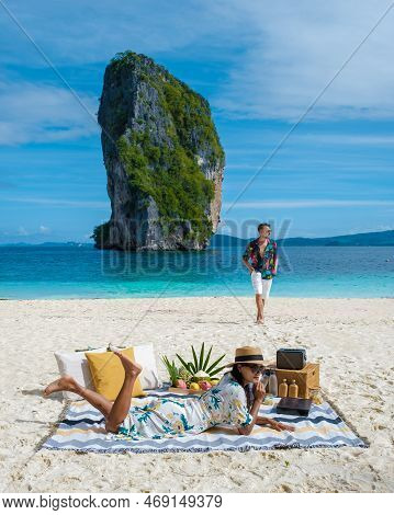 Koh Poda Krabi Thailand, Asian Woman And European Men On The Tropical Beach Of Koh Poda