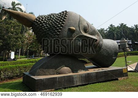 Mumbai, India - February 14, 2020: Statue Of Buddhas Head In The Garden Of The Prince Of Wales Museu