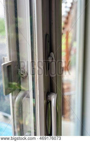 Handle, Locking Hardware, And Jam To A Sliding Glass And Screen Door.