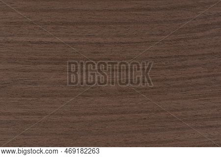 Texture Of Wenge Wood. Dark Brown Wood For Furniture Or Flooring. Close-up Of A Wenge Wooden Plank, 