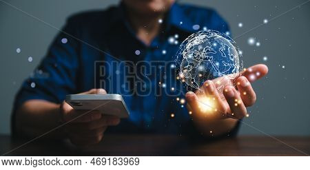 Big Data Analytics And Business Intelligence Concept. Business Person Holding Global Network Connect